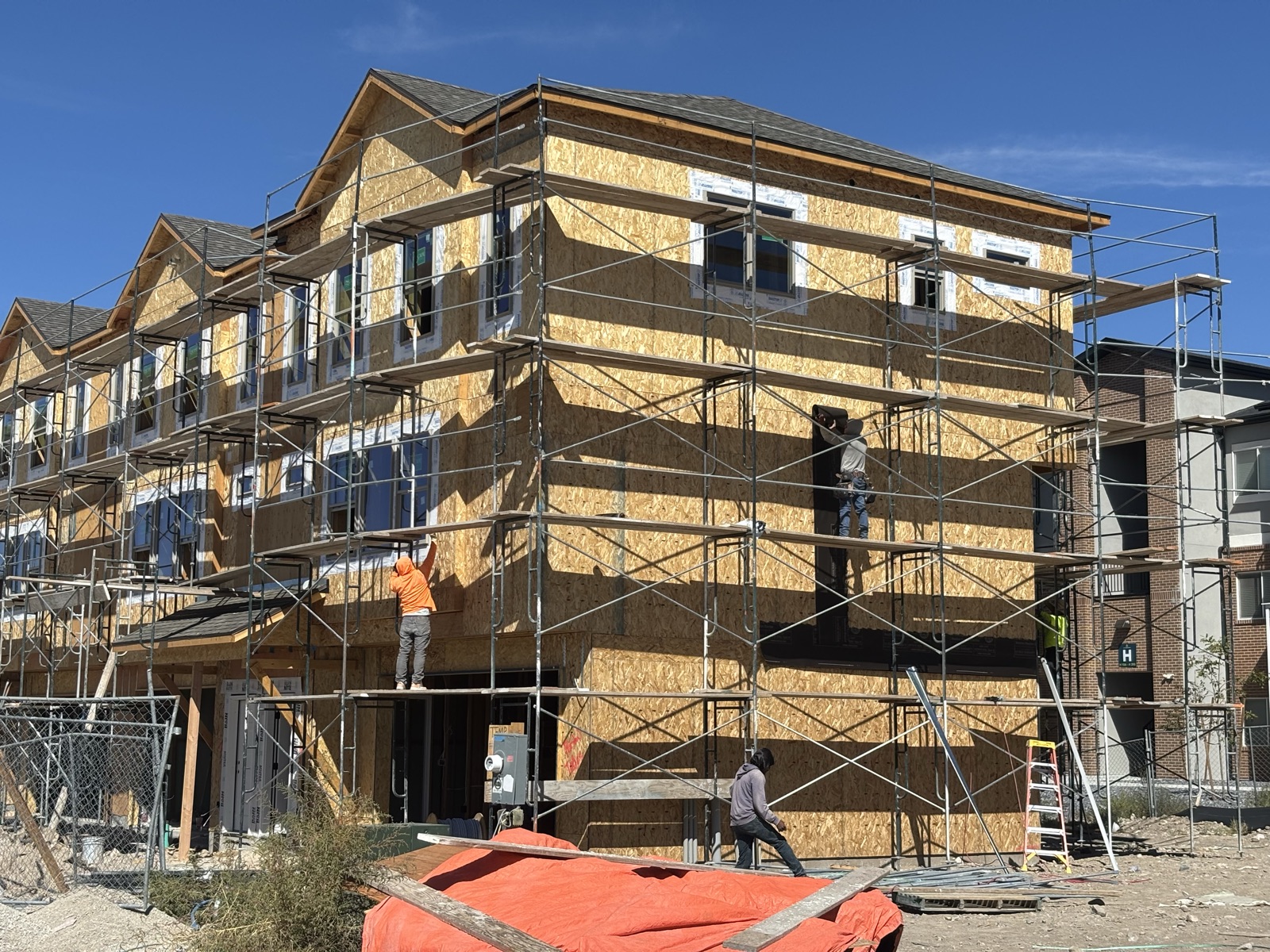 Wood-framed multi-family building under construction